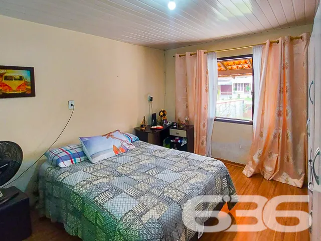 IMÓVEL COM BELO JARDIM E 3 DORMITÓRIOS NO BAIRRO I