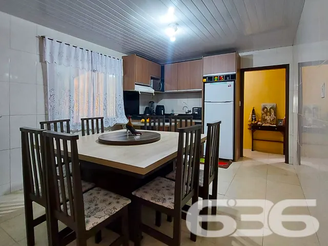 IMÓVEL COM BELO JARDIM E 3 DORMITÓRIOS NO BAIRRO I