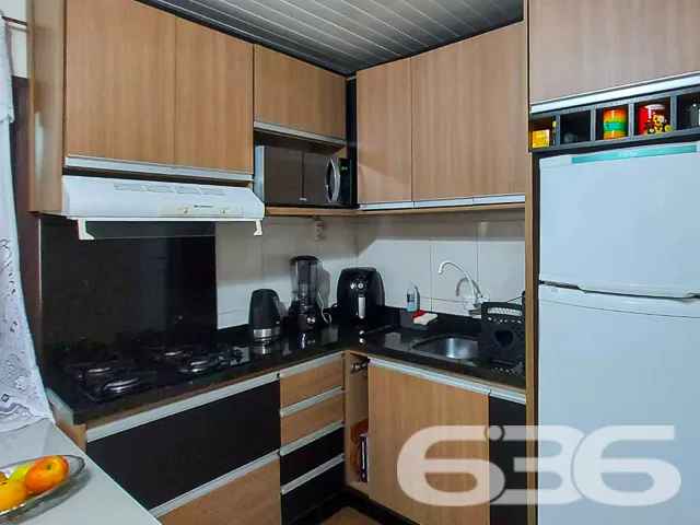 IMÓVEL COM BELO JARDIM E 3 DORMITÓRIOS NO BAIRRO I