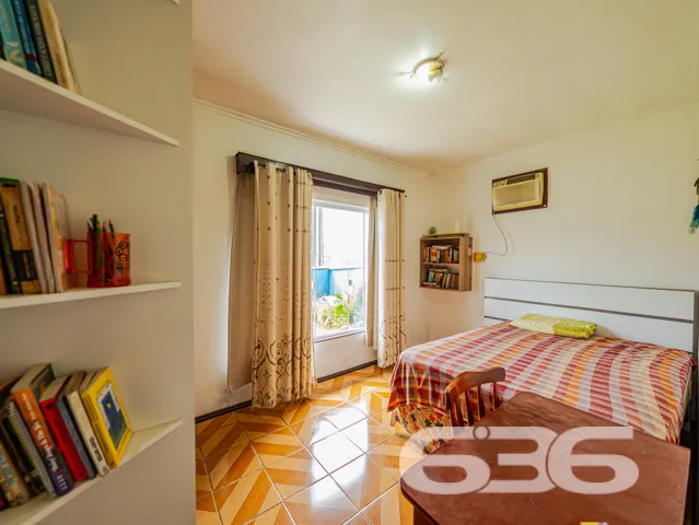 Ampla residência térrea no bairro Costa e Silva, J