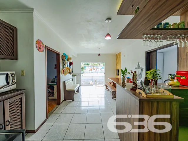 Ampla residência térrea no bairro Costa e Silva, J