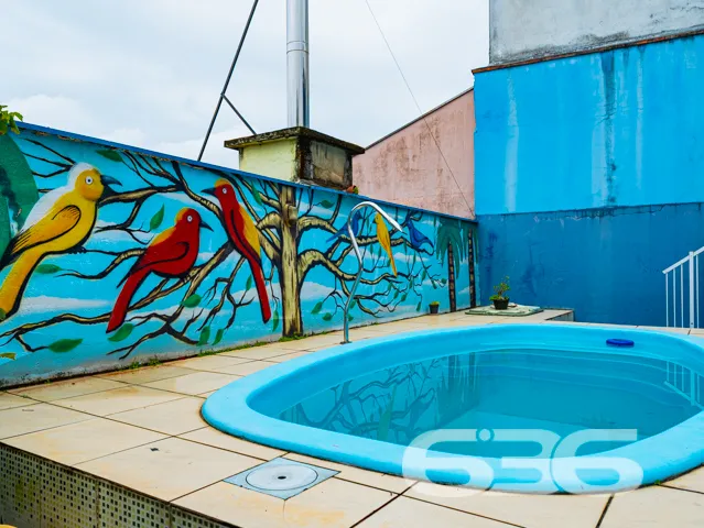 Ampla residência térrea no bairro Costa e Silva, J