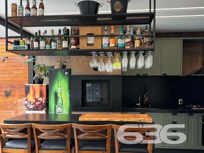 Oportunidade Exclusiva em Balneário Barra do Sul/SC — Conforto, Estilo e Sofisticação em um só lugar!
Apresentamos uma residência térrea de altíssimo padrão, pensada para quem valoriza design contemporâneo, funcionalidade e momentos memoráveis em família. Localizada no bairro Costeira, esta casa une privacidade, conforto e uma área de lazer incomparável.
Com 221,48m² de área, em um terreno plano de 405,00m², esta propriedade encanta desde o primeiro olhar. Sua planta inteligente valoriza a integração dos ambientes e proporciona luminosidade natural por toda a casa, com esquadrias amplas em vidro e pé-direito alto.
Destaques do imóvel:
1 suíte master com closet + 1 dormitório;
Sala de estar e jantar integradas à cozinha gourmet;
Banheiro social, lavabo e banheiro completo na área íntima;
Ampla área de festas com bancada gourmet, churrasqueira, adega suspensa e visual direto para o deck;
Piscina aquecida com hidromassagem, ideal para o lazer de toda a família;
Ambientes climatizados com condicionadores de ar já instalados;
Ficam todos os móveis sob medida da cozinha, banheiros, quartos e área gourmet;
4 vagas de garagem (2 cobertas e 2 descobertas);
O imóvel encontra-se próximo a vias de acesso, transporte público, escolas, mercados e demais serviços essenciais, o que agrega ainda mais valor à localização.
Este é o lar ideal para quem busca segurança, conforto e um ambiente contemporâneo e acolhedor.
Agende sua visita com um de nossos especialistas e surpreenda-se com cada detalhe!
636 Negócios Imobiliários — Há mais de 30 anos construindo histórias com responsabilidade, confiança e excelência.
636 NEGÓCIOS IMOBILIÁRIOS: A SUA MELHOR ESCOLHA
Com mais de 30 anos de experiência, a 636 Negócios Imobiliários é sua parceira ideal para encontrar o imóvel perfeito. Estamos prontos para ajudá-lo a fazer deste imóvel o seu novo lar.
Telefone: (47) 3451-0636
WhatsApp: (47) 99190-0636
Não perca esta oportunidade única. Visite nosso site para mais informações: i636.com.br