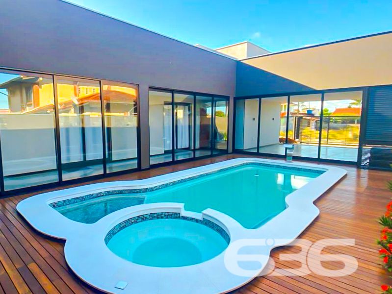 Oportunidade Exclusiva em Balneário Barra do Sul/SC — Conforto, Estilo e Sofisticação em um só lugar!
Apresentamos uma residência térrea de altíssimo padrão, pensada para quem valoriza design contemporâneo, funcionalidade e momentos memoráveis em família. Localizada no bairro Costeira, esta casa une privacidade, conforto e uma área de lazer incomparável.
Com 221,48m² de área, em um terreno plano de 405,00m², esta propriedade encanta desde o primeiro olhar. Sua planta inteligente valoriza a integração dos ambientes e proporciona luminosidade natural por toda a casa, com esquadrias amplas em vidro e pé-direito alto.
Destaques do imóvel:
1 suíte master com closet + 1 dormitório;
Sala de estar e jantar integradas à cozinha gourmet;
Banheiro social, lavabo e banheiro completo na área íntima;
Ampla área de festas com bancada gourmet, churrasqueira, adega suspensa e visual direto para o deck;
Piscina aquecida com hidromassagem, ideal para o lazer de toda a família;
Ambientes climatizados com condicionadores de ar já instalados;
Ficam todos os móveis sob medida da cozinha, banheiros, quartos e área gourmet;
4 vagas de garagem (2 cobertas e 2 descobertas);
O imóvel encontra-se próximo a vias de acesso, transporte público, escolas, mercados e demais serviços essenciais, o que agrega ainda mais valor à localização.
Este é o lar ideal para quem busca segurança, conforto e um ambiente contemporâneo e acolhedor.
Agende sua visita com um de nossos especialistas e surpreenda-se com cada detalhe!
636 Negócios Imobiliários — Há mais de 30 anos construindo histórias com responsabilidade, confiança e excelência.
636 NEGÓCIOS IMOBILIÁRIOS: A SUA MELHOR ESCOLHA
Com mais de 30 anos de experiência, a 636 Negócios Imobiliários é sua parceira ideal para encontrar o imóvel perfeito. Estamos prontos para ajudá-lo a fazer deste imóvel o seu novo lar.
Telefone: (47) 3451-0636
WhatsApp: (47) 99190-0636
Não perca esta oportunidade única. Visite nosso site para mais informações: i636.com.br
