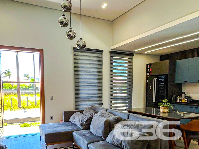 Oportunidade Exclusiva em Balneário Barra do Sul/SC — Conforto, Estilo e Sofisticação em um só lugar!
Apresentamos uma residência térrea de altíssimo padrão, pensada para quem valoriza design contemporâneo, funcionalidade e momentos memoráveis em família. Localizada no bairro Costeira, esta casa une privacidade, conforto e uma área de lazer incomparável.
Com 221,48m² de área, em um terreno plano de 405,00m², esta propriedade encanta desde o primeiro olhar. Sua planta inteligente valoriza a integração dos ambientes e proporciona luminosidade natural por toda a casa, com esquadrias amplas em vidro e pé-direito alto.
Destaques do imóvel:
1 suíte master com closet + 1 dormitório;
Sala de estar e jantar integradas à cozinha gourmet;
Banheiro social, lavabo e banheiro completo na área íntima;
Ampla área de festas com bancada gourmet, churrasqueira, adega suspensa e visual direto para o deck;
Piscina aquecida com hidromassagem, ideal para o lazer de toda a família;
Ambientes climatizados com condicionadores de ar já instalados;
Ficam todos os móveis sob medida da cozinha, banheiros, quartos e área gourmet;
4 vagas de garagem (2 cobertas e 2 descobertas);
O imóvel encontra-se próximo a vias de acesso, transporte público, escolas, mercados e demais serviços essenciais, o que agrega ainda mais valor à localização.
Este é o lar ideal para quem busca segurança, conforto e um ambiente contemporâneo e acolhedor.
Agende sua visita com um de nossos especialistas e surpreenda-se com cada detalhe!
636 Negócios Imobiliários — Há mais de 30 anos construindo histórias com responsabilidade, confiança e excelência.
636 NEGÓCIOS IMOBILIÁRIOS: A SUA MELHOR ESCOLHA
Com mais de 30 anos de experiência, a 636 Negócios Imobiliários é sua parceira ideal para encontrar o imóvel perfeito. Estamos prontos para ajudá-lo a fazer deste imóvel o seu novo lar.
Telefone: (47) 3451-0636
WhatsApp: (47) 99190-0636
Não perca esta oportunidade única. Visite nosso site para mais informações: i636.com.br