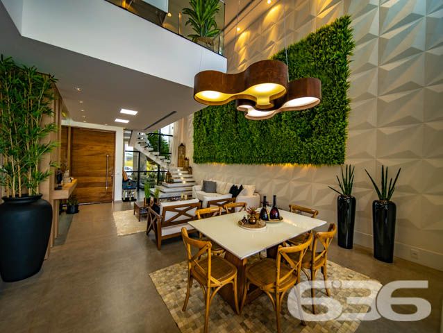 IMÓVEL DE LUXO COM EXCLUSIVIDADE E SOFISTICAÇÃO NO CORAÇÃO DE ARAQUARI!
Descubra este imponente imóvel de 285m², situado no prestigiado centro de Araquari. Com um terreno de 364m², esta residência oferece uma experiência de vida luxuosa e sofisticada, destacando-se por sua arquitetura elegante e acabamentos de alto padrão.
Espaços Planejados para Experiências Únicas
Este lar foi meticulosamente projetado para proporcionar conforto e estilo. Com 3 suítes espaçosas, sendo uma com closet, cinco banheiros e uma sala íntima aconchegante, cada espaço convida ao relaxamento. A cozinha gourmet, integrada à sala de estar e jantar, é perfeita para quem adora cozinhar e entreter. O jardim de inverno e a sacada oferecem momentos de tranquilidade e contemplação.
Lazer e Segurança no Seu Dia a Dia
A área de festas com piscina é um verdadeiro espetáculo, ideal para receber amigos e familiares. A churrasqueira e a cozinha gourmet externa complementam o cenário perfeito para celebrações memoráveis. Além disso, o imóvel conta com sistema de segurança completo, incluindo alarme, cerca elétrica e vigilância eletrônica.
Localização Privilegiada e Infraestrutura Completa
Localizado no coração de Araquari, este imóvel está próximo a todas as comodidades urbanas, sem abrir mão da tranquilidade e do charme de uma das áreas mais desejadas da cidade.
636 Negócios Imobiliários: Transformando Sonhos em Realidade
Com mais de 30 anos de experiência, a 636 Negócios Imobiliários é especialista em encontrar o lar dos seus sonhos. Para mais informações, entre em contato pelo telefone (47) 3448-3636 ou WhatsApp (47) 99190-0636. Nosso compromisso é oferecer um serviço de excelência, garantindo a realização do seu sonho imobiliário.