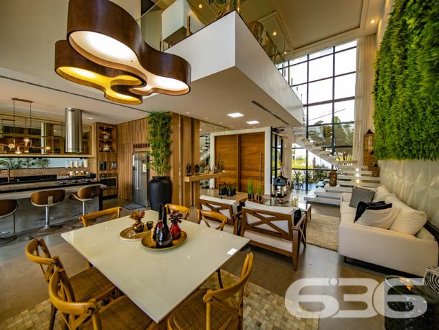 IMÓVEL DE LUXO COM EXCLUSIVIDADE E SOFISTICAÇÃO NO CORAÇÃO DE ARAQUARI!
Descubra este imponente imóvel de 285m², situado no prestigiado centro de Araquari. Com um terreno de 364m², esta residência oferece uma experiência de vida luxuosa e sofisticada, destacando-se por sua arquitetura elegante e acabamentos de alto padrão.
Espaços Planejados para Experiências Únicas
Este lar foi meticulosamente projetado para proporcionar conforto e estilo. Com 3 suítes espaçosas, sendo uma com closet, cinco banheiros e uma sala íntima aconchegante, cada espaço convida ao relaxamento. A cozinha gourmet, integrada à sala de estar e jantar, é perfeita para quem adora cozinhar e entreter. O jardim de inverno e a sacada oferecem momentos de tranquilidade e contemplação.
Lazer e Segurança no Seu Dia a Dia
A área de festas com piscina é um verdadeiro espetáculo, ideal para receber amigos e familiares. A churrasqueira e a cozinha gourmet externa complementam o cenário perfeito para celebrações memoráveis. Além disso, o imóvel conta com sistema de segurança completo, incluindo alarme, cerca elétrica e vigilância eletrônica.
Localização Privilegiada e Infraestrutura Completa
Localizado no coração de Araquari, este imóvel está próximo a todas as comodidades urbanas, sem abrir mão da tranquilidade e do charme de uma das áreas mais desejadas da cidade.
636 Negócios Imobiliários: Transformando Sonhos em Realidade
Com mais de 30 anos de experiência, a 636 Negócios Imobiliários é especialista em encontrar o lar dos seus sonhos. Para mais informações, entre em contato pelo telefone (47) 3448-3636 ou WhatsApp (47) 99190-0636. Nosso compromisso é oferecer um serviço de excelência, garantindo a realização do seu sonho imobiliário.