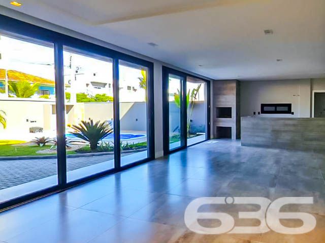 Apresentamos esta belíssima residência localizada em Itacolomi, Balneário Piçarras, Santa Catarina, que exemplifica um refúgio ideal para quem busca um equilíbrio perfeito entre design moderno e conforto sofisticado. Esta casa não apenas oferece qualidade de vida elevada, mas também se situa a apenas uma curta distância da praia, combinando conveniência com serenidade.
Esta residência se destaca por seu projeto arquitetônico impressionante que inclui dois pavimentos de puro requinte. A área construída de 200 m² é meticulosamente planejada para maximizar o espaço e a luz natural.
No interior, a casa é composta por uma suíte, duas demi-suítes e três banheiros completos. A residência também dispõe de uma garagem coberta para dois veículos, garantindo praticidade para o dia a dia. A sala de estar e jantar se integra harmoniosamente com a cozinha, formando um ambiente acolhedor para reuniões familiares e sociais. Além disso, a casa inclui uma despensa espaçosa e uma área de serviço separada.
Externamente, a propriedade é um verdadeiro oásis. A piscina e o jardim meticulosamente cuidado oferecem um retiro privativo ao ar livre, ideal para relaxar e entreter convidados. A área gourmet é um verdadeiro destaque, integrada com a cozinha e uma churrasqueira externa, perfeita para desfrutar do clima litorâneo durante o ano todo. Complementando o exterior, um pergolado cobre o abrigo para carros, enquanto o muro alto proporciona segurança e privacidade.
Descubra o potencial completo desta residência exclusiva, um lar onde cada detalhe é um reflexo de qualidade e sofisticação. Aguardamos o seu contato para agendar uma visita e mostrar por que este imóvel é o espaço ideal para começar um novo capítulo em sua vida. Venha viver onde cada dia é um privilégio, em um dos bairros mais desejados de Balneário Piçarras.
636 NEGÓCIOS IMOBILIÁRIOS: A SUA MELHOR ESCOLHA
Com mais de 30 anos de experiência, a 636 Negócios Imobiliários é sua parceira ideal para encontrar o imóvel perfeito. Estamos prontos para ajudá-lo a fazer deste imóvel o seu novo lar.
Telefone: (47) 3451-0636
WhatsApp: (47) 99190-0636
Não perca esta oportunidade única. Visite nosso site para mais informações: i636.com.br