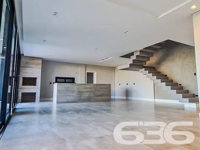 Apresentamos esta belíssima residência localizada em Itacolomi, Balneário Piçarras, Santa Catarina, que exemplifica um refúgio ideal para quem busca um equilíbrio perfeito entre design moderno e conforto sofisticado. Esta casa não apenas oferece qualidade de vida elevada, mas também se situa a apenas uma curta distância da praia, combinando conveniência com serenidade.
Esta residência se destaca por seu projeto arquitetônico impressionante que inclui dois pavimentos de puro requinte. A área construída de 200 m² é meticulosamente planejada para maximizar o espaço e a luz natural.
No interior, a casa é composta por uma suíte, duas demi-suítes e três banheiros completos. A residência também dispõe de uma garagem coberta para dois veículos, garantindo praticidade para o dia a dia. A sala de estar e jantar se integra harmoniosamente com a cozinha, formando um ambiente acolhedor para reuniões familiares e sociais. Além disso, a casa inclui uma despensa espaçosa e uma área de serviço separada.
Externamente, a propriedade é um verdadeiro oásis. A piscina e o jardim meticulosamente cuidado oferecem um retiro privativo ao ar livre, ideal para relaxar e entreter convidados. A área gourmet é um verdadeiro destaque, integrada com a cozinha e uma churrasqueira externa, perfeita para desfrutar do clima litorâneo durante o ano todo. Complementando o exterior, um pergolado cobre o abrigo para carros, enquanto o muro alto proporciona segurança e privacidade.
Descubra o potencial completo desta residência exclusiva, um lar onde cada detalhe é um reflexo de qualidade e sofisticação. Aguardamos o seu contato para agendar uma visita e mostrar por que este imóvel é o espaço ideal para começar um novo capítulo em sua vida. Venha viver onde cada dia é um privilégio, em um dos bairros mais desejados de Balneário Piçarras.
636 NEGÓCIOS IMOBILIÁRIOS: A SUA MELHOR ESCOLHA
Com mais de 30 anos de experiência, a 636 Negócios Imobiliários é sua parceira ideal para encontrar o imóvel perfeito. Estamos prontos para ajudá-lo a fazer deste imóvel o seu novo lar.
Telefone: (47) 3451-0636
WhatsApp: (47) 99190-0636
Não perca esta oportunidade única. Visite nosso site para mais informações: i636.com.br
