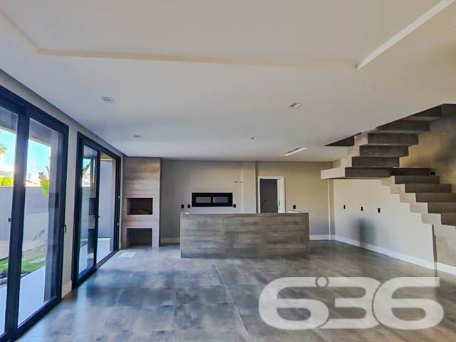 Apresentamos esta belíssima residência localizada em Itacolomi, Balneário Piçarras, Santa Catarina, que exemplifica um refúgio ideal para quem busca um equilíbrio perfeito entre design moderno e conforto sofisticado. Esta casa não apenas oferece qualidade de vida elevada, mas também se situa a apenas uma curta distância da praia, combinando conveniência com serenidade.
Esta residência se destaca por seu projeto arquitetônico impressionante que inclui dois pavimentos de puro requinte. A área construída de 200 m² é meticulosamente planejada para maximizar o espaço e a luz natural.
No interior, a casa é composta por uma suíte, duas demi-suítes e três banheiros completos. A residência também dispõe de uma garagem coberta para dois veículos, garantindo praticidade para o dia a dia. A sala de estar e jantar se integra harmoniosamente com a cozinha, formando um ambiente acolhedor para reuniões familiares e sociais. Além disso, a casa inclui uma despensa espaçosa e uma área de serviço separada.
Externamente, a propriedade é um verdadeiro oásis. A piscina e o jardim meticulosamente cuidado oferecem um retiro privativo ao ar livre, ideal para relaxar e entreter convidados. A área gourmet é um verdadeiro destaque, integrada com a cozinha e uma churrasqueira externa, perfeita para desfrutar do clima litorâneo durante o ano todo. Complementando o exterior, um pergolado cobre o abrigo para carros, enquanto o muro alto proporciona segurança e privacidade.
Descubra o potencial completo desta residência exclusiva, um lar onde cada detalhe é um reflexo de qualidade e sofisticação. Aguardamos o seu contato para agendar uma visita e mostrar por que este imóvel é o espaço ideal para começar um novo capítulo em sua vida. Venha viver onde cada dia é um privilégio, em um dos bairros mais desejados de Balneário Piçarras.
636 NEGÓCIOS IMOBILIÁRIOS: A SUA MELHOR ESCOLHA
Com mais de 30 anos de experiência, a 636 Negócios Imobiliários é sua parceira ideal para encontrar o imóvel perfeito. Estamos prontos para ajudá-lo a fazer deste imóvel o seu novo lar.
Telefone: (47) 3451-0636
WhatsApp: (47) 99190-0636
Não perca esta oportunidade única. Visite nosso site para mais informações: i636.com.br