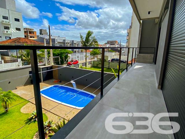 Apresentamos esta belíssima residência localizada em Itacolomi, Balneário Piçarras, Santa Catarina, que exemplifica um refúgio ideal para quem busca um equilíbrio perfeito entre design moderno e conforto sofisticado. Esta casa não apenas oferece qualidade de vida elevada, mas também se situa a apenas uma curta distância da praia, combinando conveniência com serenidade.
Esta residência se destaca por seu projeto arquitetônico impressionante que inclui dois pavimentos de puro requinte. A área construída de 200 m² é meticulosamente planejada para maximizar o espaço e a luz natural.
No interior, a casa é composta por uma suíte, duas demi-suítes e três banheiros completos. A residência também dispõe de uma garagem coberta para dois veículos, garantindo praticidade para o dia a dia. A sala de estar e jantar se integra harmoniosamente com a cozinha, formando um ambiente acolhedor para reuniões familiares e sociais. Além disso, a casa inclui uma despensa espaçosa e uma área de serviço separada.
Externamente, a propriedade é um verdadeiro oásis. A piscina e o jardim meticulosamente cuidado oferecem um retiro privativo ao ar livre, ideal para relaxar e entreter convidados. A área gourmet é um verdadeiro destaque, integrada com a cozinha e uma churrasqueira externa, perfeita para desfrutar do clima litorâneo durante o ano todo. Complementando o exterior, um pergolado cobre o abrigo para carros, enquanto o muro alto proporciona segurança e privacidade.
Descubra o potencial completo desta residência exclusiva, um lar onde cada detalhe é um reflexo de qualidade e sofisticação. Aguardamos o seu contato para agendar uma visita e mostrar por que este imóvel é o espaço ideal para começar um novo capítulo em sua vida. Venha viver onde cada dia é um privilégio, em um dos bairros mais desejados de Balneário Piçarras.
636 NEGÓCIOS IMOBILIÁRIOS: A SUA MELHOR ESCOLHA
Com mais de 30 anos de experiência, a 636 Negócios Imobiliários é sua parceira ideal para encontrar o imóvel perfeito. Estamos prontos para ajudá-lo a fazer deste imóvel o seu novo lar.
Telefone: (47) 3451-0636
WhatsApp: (47) 99190-0636
Não perca esta oportunidade única. Visite nosso site para mais informações: i636.com.br
