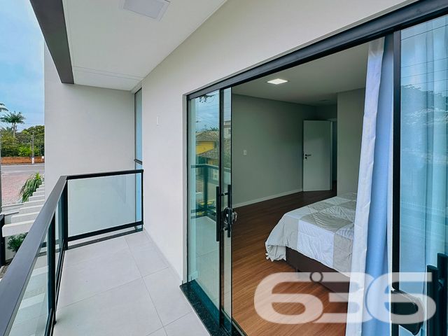 Apresentamos uma oportunidade exclusiva de residir em uma propriedade de alto padrão localizada a apenas 150 metros da praia, no tranquilo bairro de Armação, Penha - SC.
O design moderno é complementado por móveis planejados de alta qualidade, que estão incluídos na oferta. O sobrado é caracterizado por sua funcionalidade e elegância, com acabamentos de primeira linha que garantem beleza e durabilidade.
No térreo, encontramos uma ampla sala de estar, integrada a uma cozinha moderna, que inclui uma copa e cozinha conjugadas, criando um ambiente aconchegante e ideal para momentos em família. A área de festas, com churrasqueira e vista para o jardim de inverno, oferece um espaço perfeito para entretenimento e relaxamento.
O imóvel possui duas garagens, uma coberta e outra descoberta, garantindo comodidade para seus veículos. A residência também inclui um portão eletrônico, interfone e um sistema de alarme, proporcionando segurança e privacidade.
A área íntima, localizada no piso superior, é composta por dois dormitórios, incluindo uma suíte master com sacada, oferecendo uma vista tranquila do bairro. Os três banheiros são equipados com materiais de qualidade, destacando-se por seu design contemporâneo.
Esta residência é ideal para aqueles que valorizam a proximidade com a natureza e a tranquilidade, estando perto de escolas, serviços públicos essenciais e vias de acesso. Além disso, a estrutura permite a presença de animais de estimação, garantindo que toda a família possa desfrutar deste lar.
Venha descobrir o equilíbrio perfeito entre conforto, segurança e luxo neste imóvel de alto padrão. A 636 Negócios Imobiliários está pronta para lhe auxiliar na realização do seu sonho. Visite-nos e sinta o prazer de estar tão perto do paraíso que é a praia, num lar que é um verdadeiro refúgio de paz e sofisticação.
636 NEGÓCIOS IMOBILIÁRIOS: A SUA MELHOR ESCOLHA
Com mais de 30 anos de experiência, a 636 Negócios Imobiliários é sua parceira ideal para encontrar o imóvel perfeito. Estamos prontos para ajudá-lo a fazer deste imóvel o seu novo lar.
Telefone: (47) 3451-0636
WhatsApp: (47) 99190-0636
Não perca esta oportunidade única. Visite nosso site para mais informações: i636.com.br