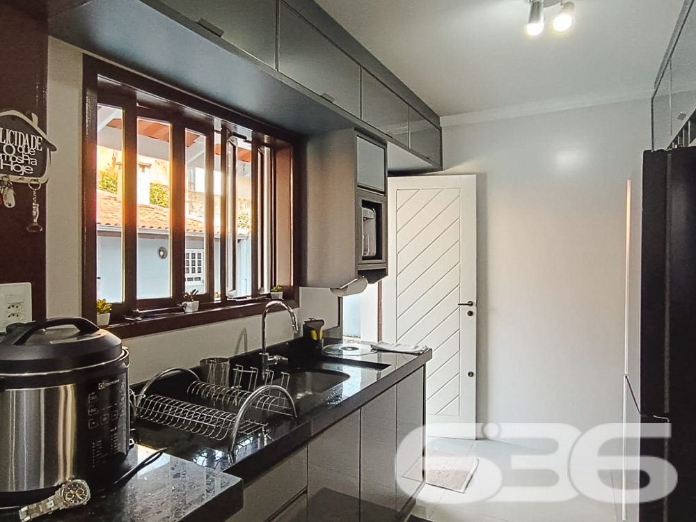 Descubra o lar dos seus sonhos em Joinville, no bairro Itaum. Esta residência padrão térrea, oferece 247,09 m² de área construída, proporcionando espaço e conforto para toda a família.
Ao entrar, você será recebido por uma sala de estar acolhedora, seguida de uma sala íntima ideal para momentos de relaxamento. A cozinha espaçosa, pronta para preparar suas refeições favoritas. Destaca-se pela sua funcionalidade e pelo acesso direto à área de festas, onde um fogão a lenha e uma churrasqueira convidam para momentos memoráveis ao lado de amigos e familiares.
A residência é composta por quatro dormitórios aconchegantes, uma suíte com closet, oferecendo um refúgio privativo e confortável. Todos os quartos estão bem iluminados e ventilados, criando um ambiente tranquilo e acolhedor.
Externamente, a propriedade é um verdadeiro oásis, com um jardim encantador, uma piscina que promete ser o centro das atenções durante os meses mais quentes, e uma edícula com lavanderia, banheiro adicional, e espaços que podem ser adaptados para quarto ou cozinha extra.
Esta casa também é equipada com portão eletrônico e sistema de câmeras, proporcionando segurança e privacidade para sua família. Localizada em uma rua pavimentada e com fácil acesso a vias principais, a propriedade está próxima a escolas, hospitais, shopping centers e todos os serviços públicos essenciais, garantindo conveniência para o seu dia a dia.
Em suma, esta residência não é apenas um imóvel, mas um lar repleto de potencial para criar memórias duradouras. Se você está buscando uma casa que combina conforto, segurança e uma localização excelente, esta é uma oportunidade imperdível. Venha conhecer e deixe-se encantar por cada detalhe!
636 Negócios Imobiliários, mais de 30 anos de experiência transformando sonhos em realidade.
636 NEGÓCIOS IMOBILIÁRIOS: A SUA MELHOR ESCOLHA
Com mais de 30 anos de experiência, a 636 Negócios Imobiliários é sua parceira ideal para encontrar o imóvel perfeito. Estamos prontos para ajudá-lo a fazer deste imóvel o seu novo lar.
Telefone: (47) 3451-0636
WhatsApp: (47) 99190-0636
Não perca esta oportunidade única. Visite nosso site para mais informações: i636.com.br