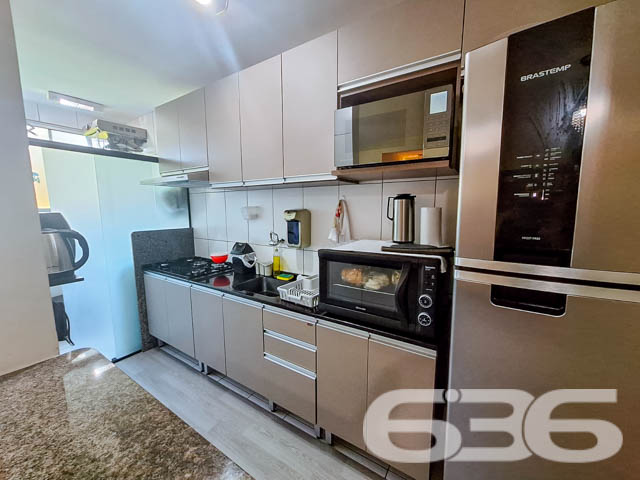Descubra o equilíbrio perfeito entre estilo de vida e conveniência neste encantador apartamento de 74,87 m². Este imóvel conta com dois dormitórios aconchegantes, incluindo uma suíte principal com todas as comodidades necessárias para um descanso tranquilo e revitalizante. A sala de estar e jantar integradas proporcionam um ambiente fluído e acolhedor, perfeito para momentos de relaxamento e celebrações com familiares e amigos. A cozinha, modernamente equipada, oferece armários planejados e espaço suficiente para preparar suas melhores receitas.
Características:
Área de serviço funcional adjacente à cozinha, facilitando as tarefas diárias.
Sacada espaçosa, ideal para desfrutar do clima agradável de Joinville e apreciar a vista serena.
Garagem coberta garantindo segurança e comodidade para seu veículo.
Área de festas no condomínio, equipada para receber seus convidados com todo o conforto e exclusividade.
Localização: Situado no coração de Joinville, o bairro Boa Vista é conhecido por sua tranquilidade e acesso facilitado a uma variedade de serviços e comércios. Além disso, a rua pavimentada e a orientação oeste do edifício garantem fácil acesso e ótima iluminação natural ao longo do dia.
Este apartamento não é apenas um lugar para morar, é um espaço para criar memórias duradouras. Ele oferece uma combinação ideal de conforto, estilo e localização, fazendo dele uma escolha perfeita para quem busca qualidade de vida e valor agregado. Invista no seu futuro, escolha viver bem, escolha este magnífico apartamento em Joinville.
636 Negócios Imobiliários, com mais de 30 anos de experiência no mercado imobiliário, tem o prazer de apresentar este imóvel exclusivo. Para mais informações e agendamento de visitas, entre em contato conosco hoje mesmo e descubra como podemos ajudá-lo a encontrar o lar dos seus sonhos.
636 NEGÓCIOS IMOBILIÁRIOS: A SUA MELHOR ESCOLHA
Com mais de 30 anos de experiência, a 636 Negócios Imobiliários é sua parceira ideal para encontrar o imóvel perfeito. Estamos prontos para ajudá-lo a fazer deste imóvel o seu novo lar.
Telefone: (47) 3451-0636
WhatsApp: (47) 99190-0636
Não perca esta oportunidade única. Visite nosso site para mais informações: i636.com.br