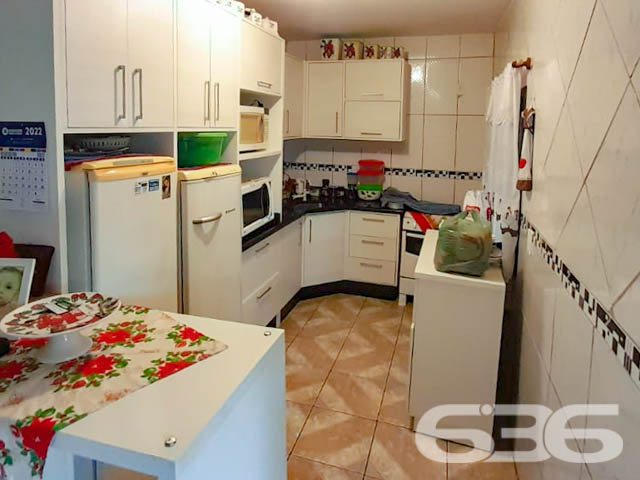 BELÍSSIMO SOBRADO COM  2 SUÍTES E 4 QUARTOS, NO BAIRRO ITINGA, EM JOINVILLE - ESTUDA PERMUTA

São 367 m² de terreno e 120 m² de área construída de um espaçoso e aconchegante sobrado com bom padrão de construção. 

O imóvel possui amplo espaço na área debaixo, com ótimas possibilidades de ser utilizado como área comercial ou de moradia. 

Seus cômodos são super confortáveis e muito bem divididos, composto de 2 suítes e mais 4 dormitórios, sala de estar, 2 cozinhas, sacada e 4 banheiros. 

Imóvel é todo murado, contendo um pequeno jardim na parte externa da casa, com plantas e flores muito bem cultivadas, deixando assim o ambiente mais agradável. 

Além de uma adorável área de festas com churrasqueira e fogão a lenha, para lhe proporcionar ótimos momentos de lazer. 
Com garagem para até 3 veículos, sendo 2 vagas cobertas, com portão eletrônico.  

Situado no bairro Itinga, zona sul de Joinville, com fácil acesso às principais vias da região, fica a cerca de 30 minutos do centro da cidade. Próximo de mercados, ponto de ônibus, lojas e outros serviços de grande utilidade.

Agende sua visita com um de nossos corretores e conheça pessoalmente esse belo sobrado, quem sabe não seja seu novo lar.
Esperamos por você!

SAIBA MAIS
Telefone: (47) 3451-0636
WhatsApp: (47) 99190-0636