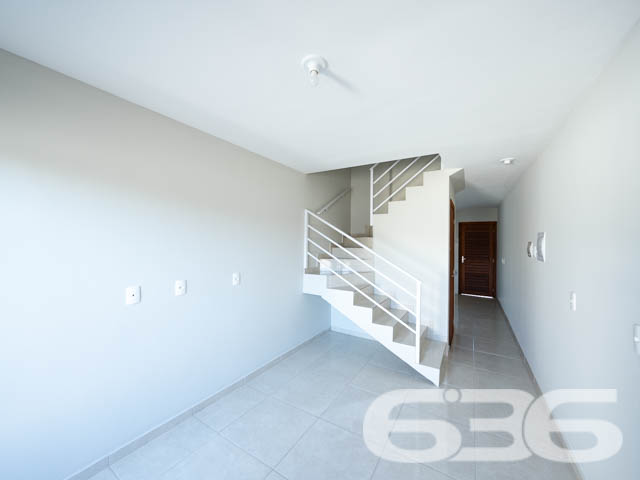 Geminado Sobrado Novo à Venda no Bairro Paranaguamirim, Joinville - SC

Apresentamos este incrível geminado sobrado, situado em uma localização privilegiada no bairro Paranaguamirim, Joinville - SC. Esta residência oferece um design moderno e funcional, ideal para quem busca conforto e praticidade. Esta propriedade foi planejada para maximizar o aproveitamento de espaço e proporcionar um ambiente acolhedor e elegante para sua família.

Destaques do Imóvel:

Área Construída: 65,43 m²
Tipologia: Sobrado Geminado

Composição do Imóvel:

2 Dormitórios: Espaçosos e bem ventilados, perfeitos para o descanso da família.
Sala de Estar: Ambiente aconchegante e ideal para momentos de lazer e convivência.
Cozinha: Funcional, projetada para otimizar o espaço e facilitar o dia a dia.
Banheiro: Moderno e equipado com acabamentos de qualidade.
Lavabo: Praticidade e comodidade para você e suas visitas.
Área de Serviço: Espaço dedicado para a lavanderia e demais serviços domésticos.
Sacada: Com excelente vista e boa ventilação, ideal para relaxar e apreciar a paisagem.
2 Vagas de Garagem: Garantindo espaço e segurança para os seus veículos.
Quintal: Área externa de fundos com 10 metros, perfeito para um jardim ou espaço de lazer.
Este sobrado se destaca não apenas pela sua construção moderna e bem acabada, mas também pela localização estratégica. Situado em uma rua pavimentada e de fácil acesso, você estará próximo a escolas, supermercados, farmácias e demais comodidades que o bairro de Paranaguamirim oferece.
 
636 NEGÓCIOS IMOBILIÁRIOS: A SUA MELHOR ESCOLHA
Com mais de 30 anos de experiência, a 636 Negócios Imobiliários é sua parceira ideal para encontrar o imóvel perfeito. Estamos prontos para ajudá-lo a fazer deste imóvel o seu novo lar.
 
Telefone: (47) 3451-0636
WhatsApp: (47) 99190-0636
 
Não perca esta oportunidade única. Visite nosso site para mais informações: i636.com.br