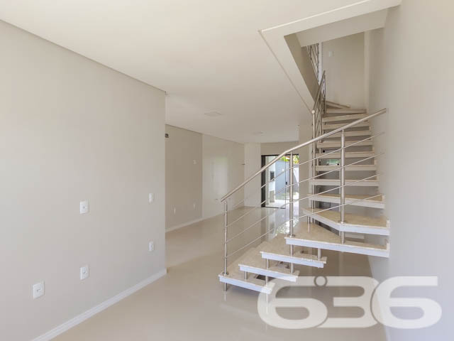 Se você busca conforto, modernidade e uma localização privilegiada, este sobrado geminado é o imóvel ideal para sua família. Localizado no bairro Bom Retiro, em Joinville (SC), esse imóvel conta com uma estrutura contemporânea, que combina amplitude e excelente aproveitamento dos espaços. Estuda permuta.

Composição do imóvel: 

3 dormitórios
1 suíte, oferecendo espaço ideal para o descanso e privacidade
3 banheiros, que garantem comodidade para toda a família
Sala de estar e sala de jantar integradas, projetadas para receber amigos e familiares com conforto
Cozinha e copa conjugadas, criando um ambiente prático e acolhedor para as refeições do dia a dia
Lavabo prático para atender às visitas
Área de serviço separada, garantindo organização

Detalhes de Acabamento e Conforto:

Churrasqueira privativa, perfeita para momentos de lazer e celebrações.
Portão eletrônico, que oferece segurança e facilidade de acesso.
Ambientes iluminados e arejados: Janelas amplas que trazem luz natural e vistas agradáveis do entorno, como visto nas fotos. A luz que invade cada espaço destaca os acabamentos neutros e o piso em madeira, proporcionando um toque de sofisticação.

Localização Estratégica: Situado no bairro Bom Retiro, este sobrado oferece uma localização privilegiada. A poucos minutos de vias de acesso, transporte público e grandes centros comerciais, você terá toda a conveniência de estar próximo a serviços essenciais e lazer.

Se você procura um imóvel que ofereça um equilíbrio perfeito entre localização, conforto e modernidade, esta é a oportunidade que não pode deixar passar. Agende sua visita agora mesmo e venha se encantar com cada detalhe deste sobrado geminado que combina segurança, praticidade e um design pensado para o bem-estar da sua família!
 
636 NEGÓCIOS IMOBILIÁRIOS: A SUA MELHOR ESCOLHA
Com mais de 30 anos de experiência, a 636 Negócios Imobiliários é sua parceira ideal para encontrar o imóvel perfeito. Estamos prontos para ajudá-lo a fazer deste imóvel o seu novo lar.
 
Telefone: (47) 3451-0636
WhatsApp: (47) 99190-0636
 
Não perca esta oportunidade única. Visite nosso site para mais informações: i636.com.br

