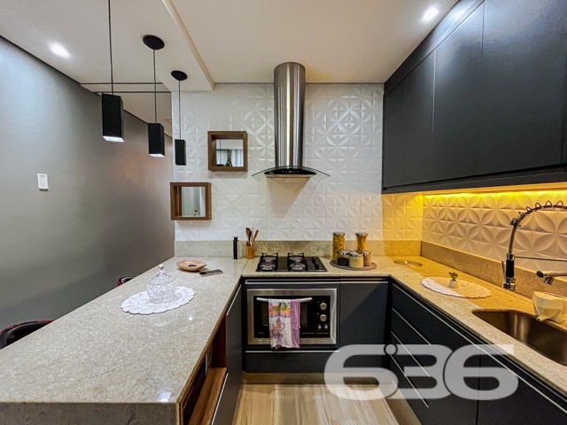 Apresentamos com exclusividade este refinado sobrado localizado no tranquilo bairro Boa Vista, em Joinville/SC. Ideal para quem busca conforto e qualidade de vida, a residência dispõe de acabamentos de alto padrão e uma estrutura pensada para o bem-estar de sua família.
Este imóvel de 63,18m² de área, está edificado em um terreno de 82,50m², com dimensões perfeitas para aproveitamento de espaço, mantendo a privacidade essencial.
Ao entrar no imóvel, você será recebido por uma elegante sala de estar que se destaca por seu design moderno e aconchegante.
A residência possui dois dormitórios, sendo um deles especialmente decorado para crianças, com espaços otimizados para brinquedos e estudos. O segundo dormitório, a suíte principal, oferece conforto e privacidade, com uma vista serena para o entorno do bairro.
Os dois banheiros da casa são revestidos com materiais de primeira linha e apresentam um design sofisticado. A área de serviço é coberta, garantindo praticidade no dia a dia.
No exterior, uma charmosa edícula com churrasqueira proporciona um espaço ideal para recepções e momentos de lazer com a família e amigos. A garagem coberta comporta até dois veículos, com adicional segurança proporcionada por um portão eletrônico e sistema de interfone.
Esta residência também é pet friendly, permitindo que seus animais de estimação desfrutem do lar tão confortável quanto você.
Convidamos você a conhecer esse espaço onde cada detalhe foi pensado para proporcionar conforto e praticidade. Este imóvel não é apenas uma casa, mas um lar pronto para criar memórias duradouras. Para mais informações e agendar sua visita, entre em contato com a 636 Negócios Imobiliários, sua parceira ideal no mercado imobiliário por mais de 30 anos, onde grandes negócios começam com grandes oportunidades.
636 NEGÓCIOS IMOBILIÁRIOS: A SUA MELHOR ESCOLHA
Com mais de 30 anos de experiência, a 636 Negócios Imobiliários é sua parceira ideal para encontrar o imóvel perfeito. Estamos prontos para ajudá-lo a fazer deste imóvel o seu novo lar.
Telefone: (47) 3451-0636
WhatsApp: (47) 99190-0636
Não perca esta oportunidade única. Visite nosso site para mais informações: i636.com.br