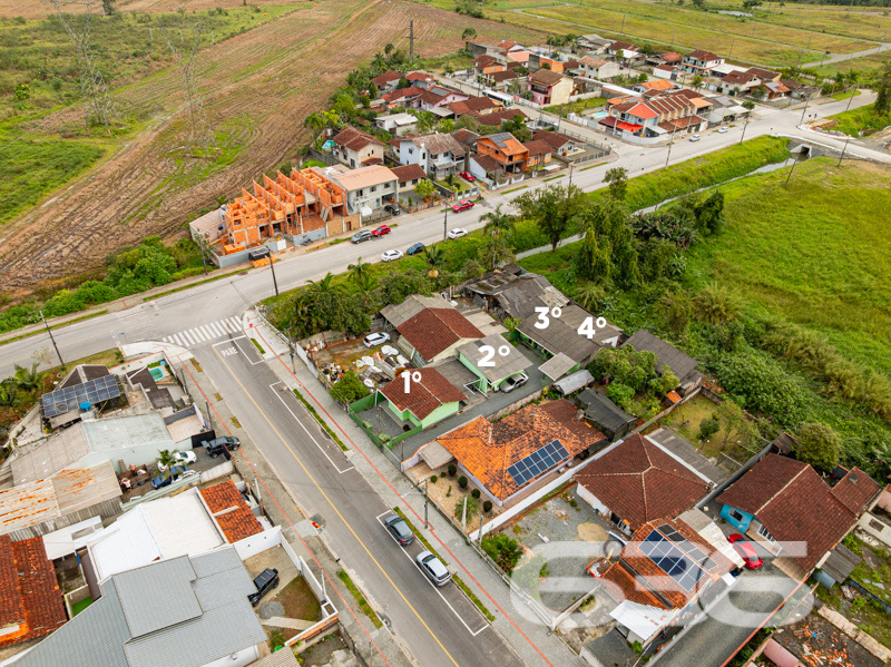 Terreno com 4 casas à venda no bairro Vila Nova, J
